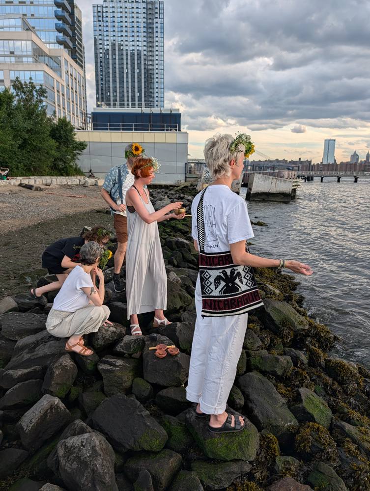 Ritual to the sun on the river rocks